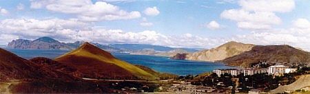 A panoramic view of the quiet town of Ordzonikidze in Crimea and the inactive volcano, Caradag